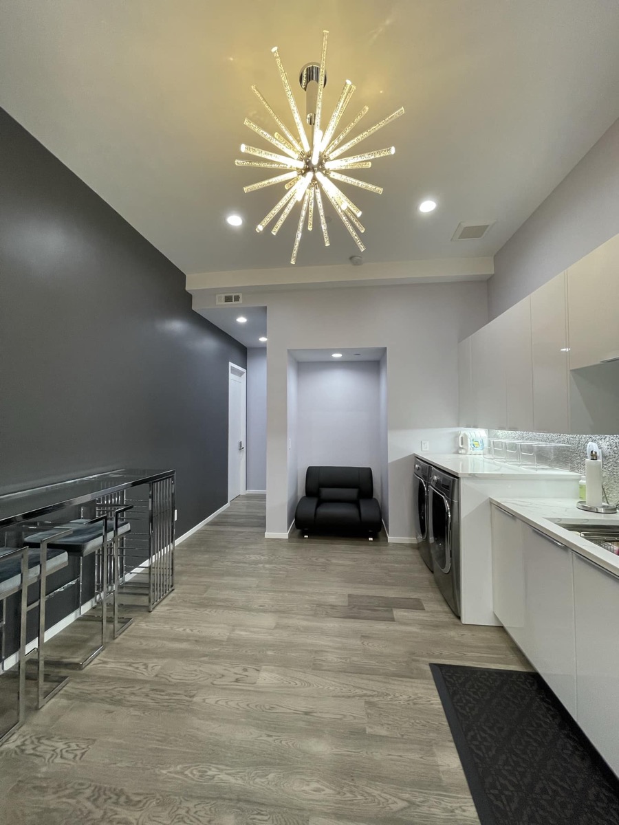 Open kitchen, laundry and living area