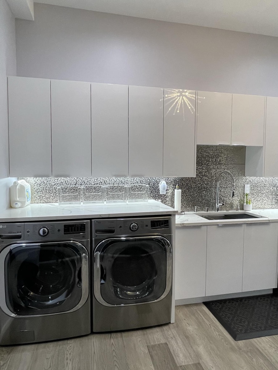Laundry area with kitchen sink